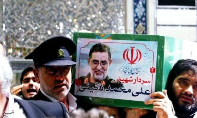 طواف پیکر سردار شهید نائینی بر گرد ضریح حضرت معصومه(س)